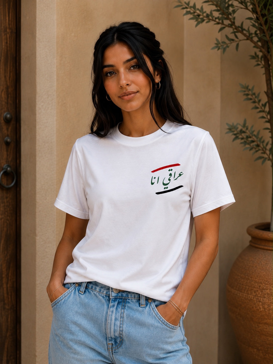 Woman wearing white I'm Iraqi T-shirt, front view